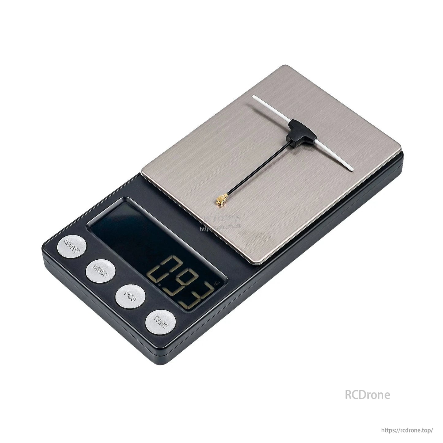 Dipole T antenna placed on digital scale showing weight reading