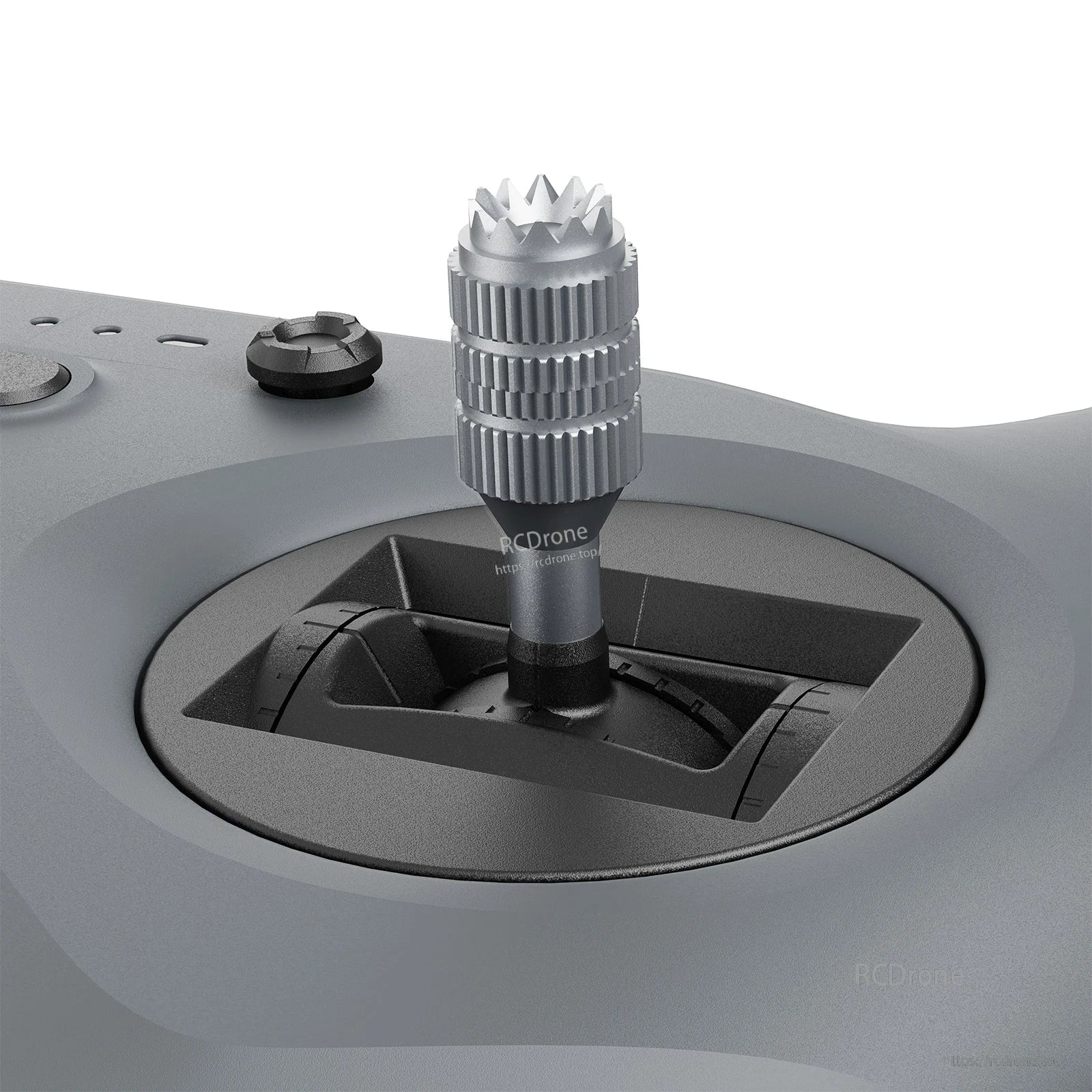 Gimbal control stick close-up (dark color) showing metal stick end and gimbal opening