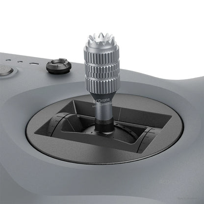 Gimbal control stick close-up (dark color) showing metal stick end and gimbal opening