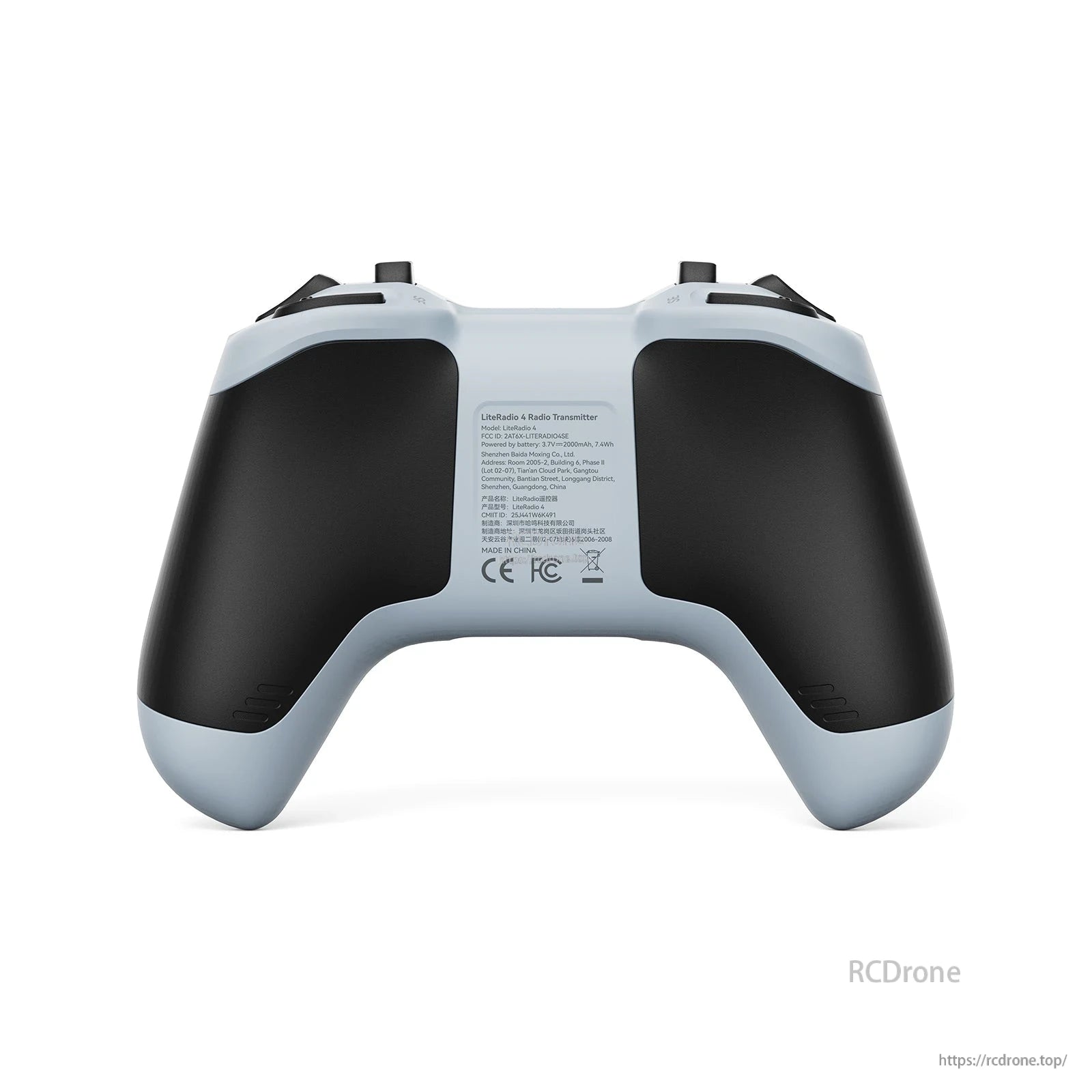 Rear view of LiteRadio 4 transmitter in light color, showing grip shape and rear specification label