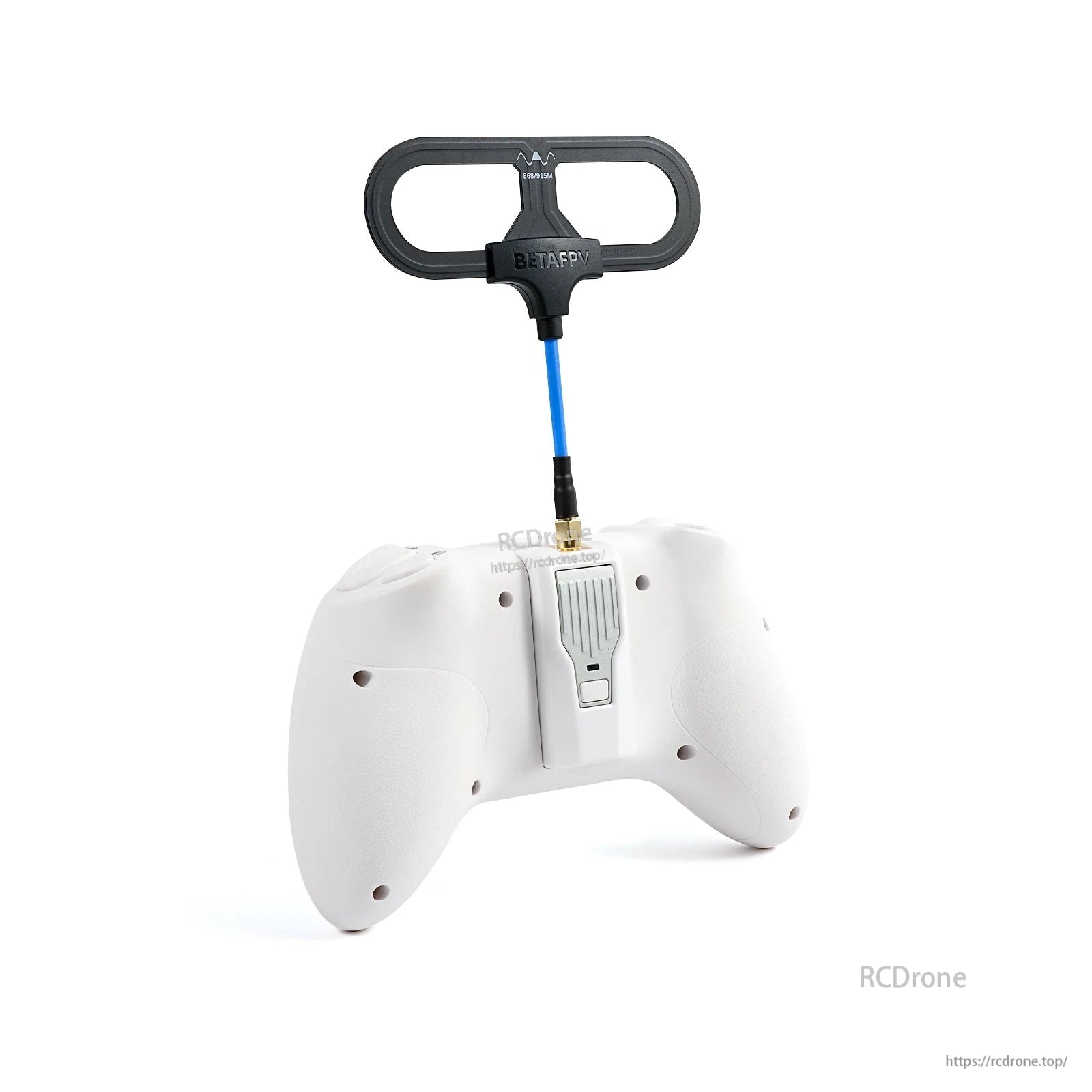 Rear view of white RC transmitter with loop antenna mounted on top via SMA connector, straight-on angle