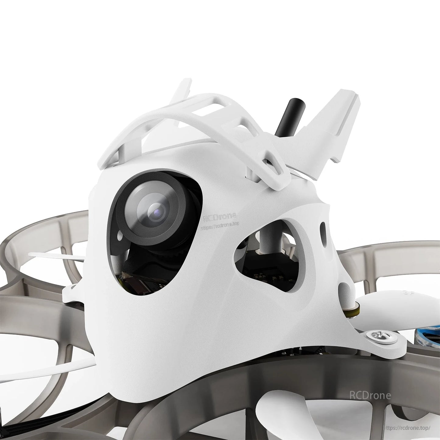 Close-up of a white BETAFPV FPV whoop drone canopy with front camera lens and protective ducted frame