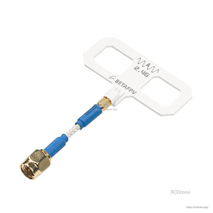 White 2.4G Moxon panel antenna close-up showing BETAFPV logo, coax braid, and gold connector