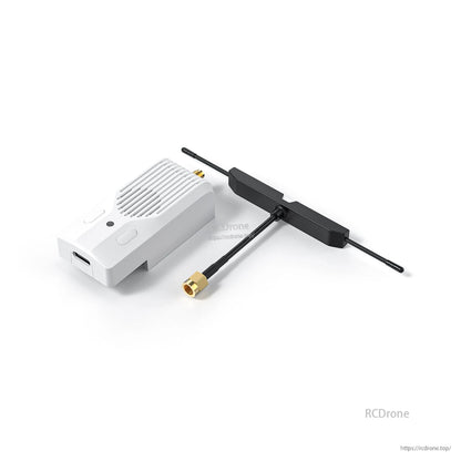 BETAFPV Nano TX V2 Transmitter module with T-style antenna and coax pigtail on white background