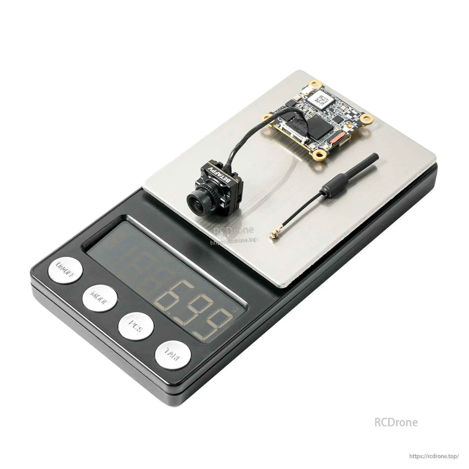 P1 Air Unit HD VTX and camera on digital scale showing 6.89 g weight