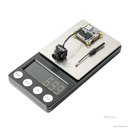P1 Air Unit HD VTX and camera on digital scale showing 6.89 g weight