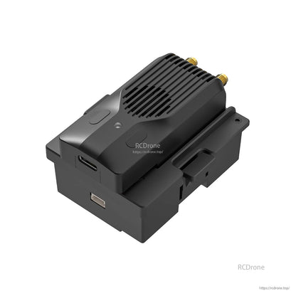 Transmitter module installed on adapter base, showing USB-C and side port openings