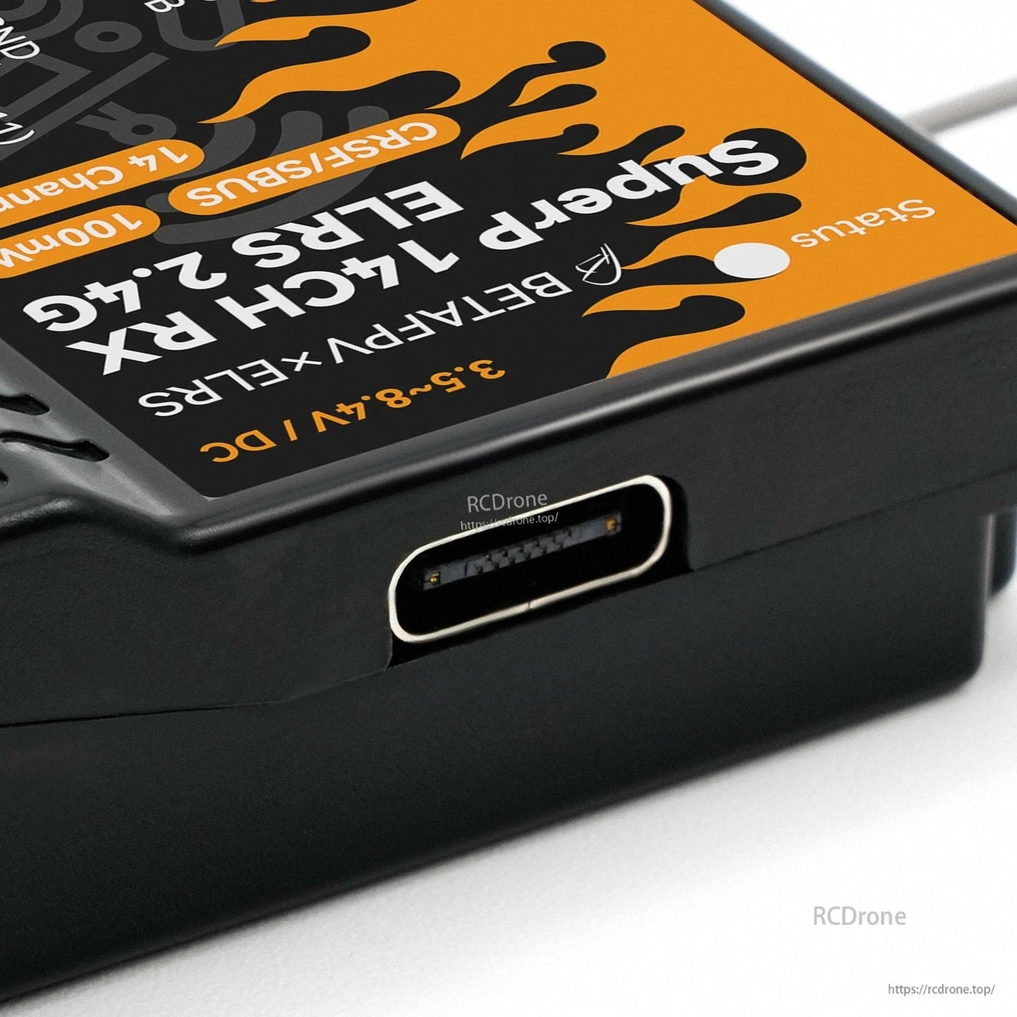 USB-C port close-up on receiver case, showing recessed connector opening