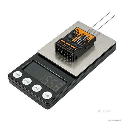 Receiver resting on a digital scale, weight reference view from above