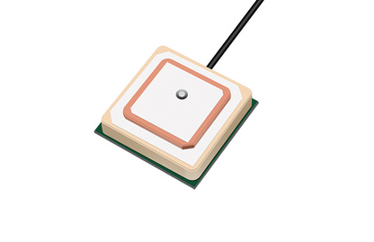 Ceramic GNSS patch antenna element on small PCB with cable, angled top view