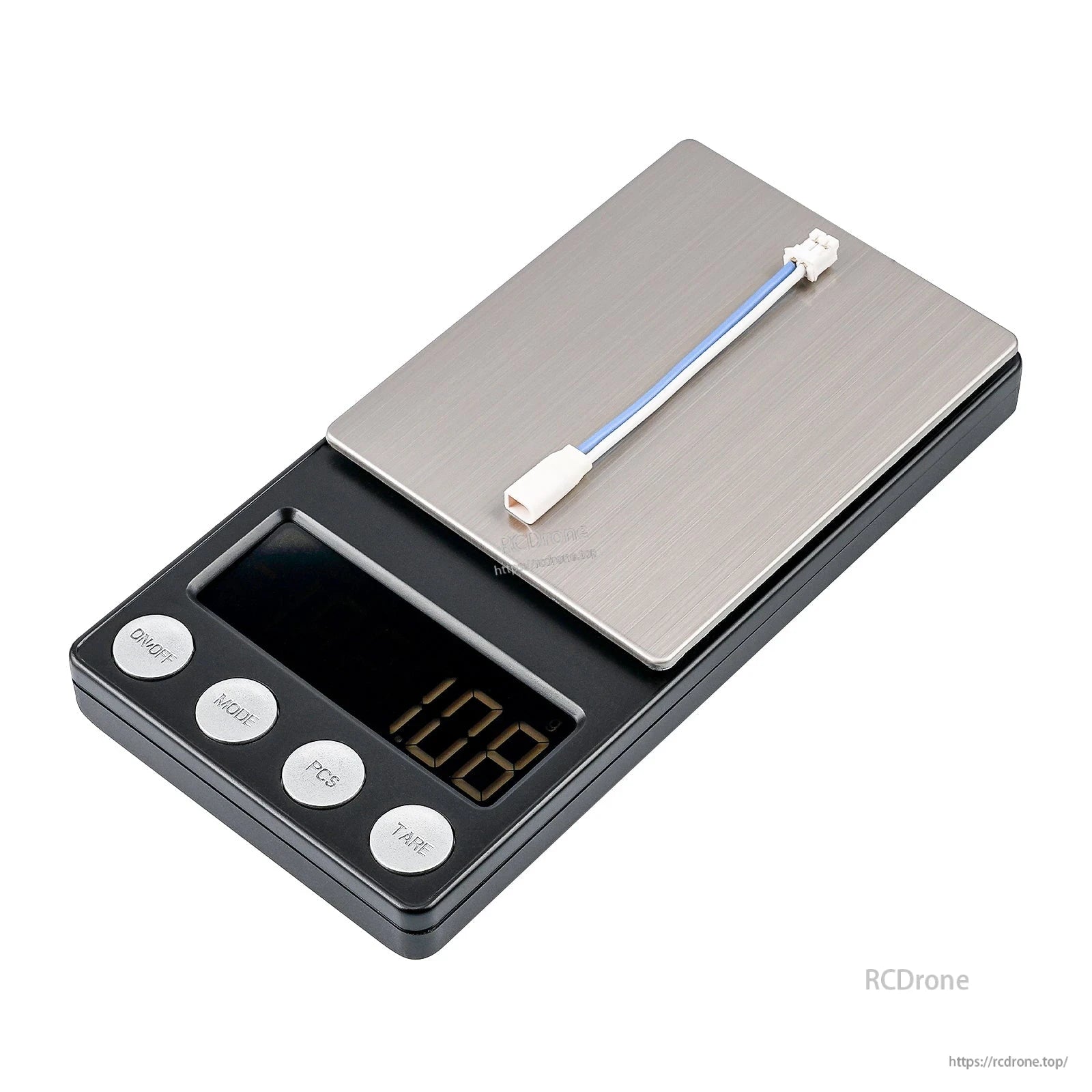 Adapter cable on digital scale showing 1.08 g weight reading