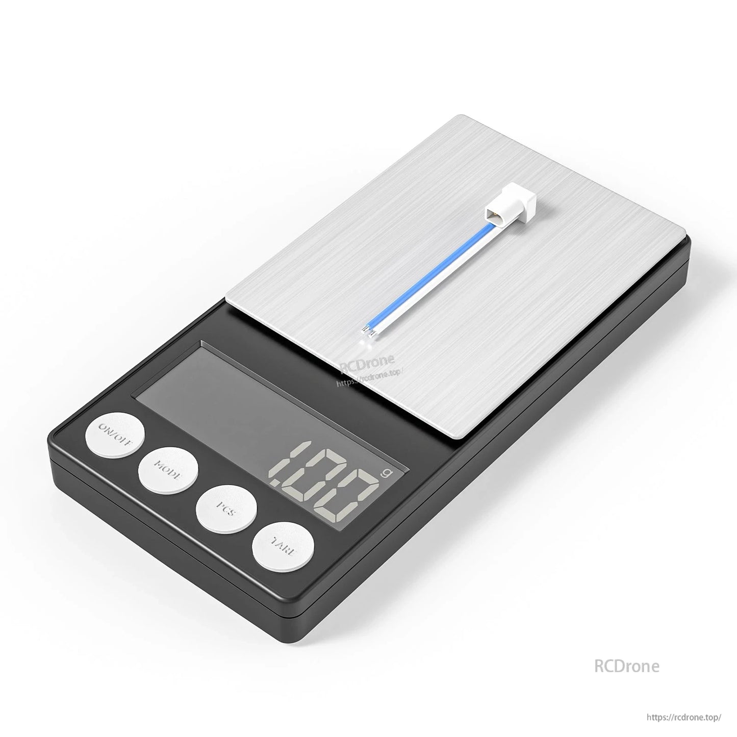 on digital scale showing 1.02 g weight, white plug with short leads