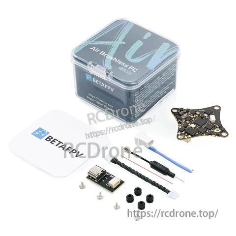 Air Brushless FC kit contents laid out with storage case, flight controller board, wiring harness, screws and mounts
