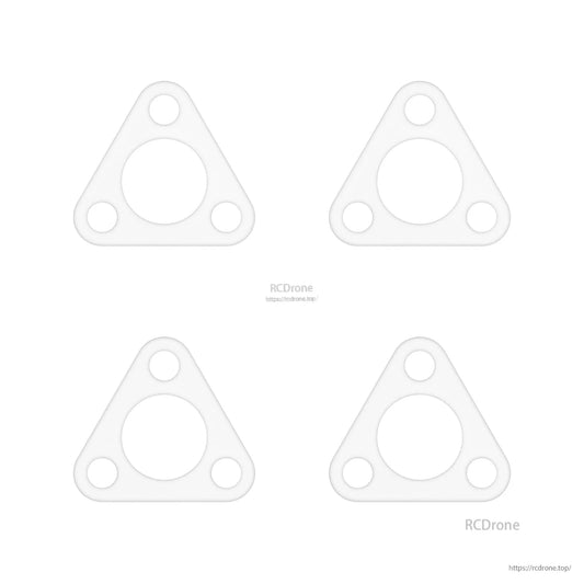 Set of four clear triangular motor gaskets for micro whoop frame, flat lay