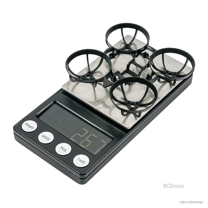 Black Air65 whoop frame on digital scale showing 2.66g weight