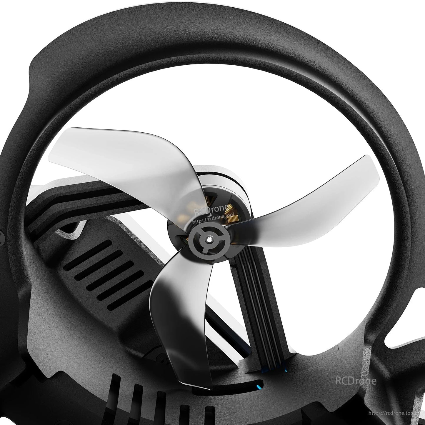 Close-up of a BetaFPV ducted micro drone showing a translucent three-blade propeller inside a protective shroud