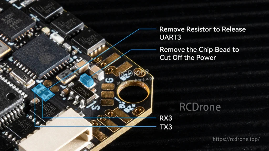 Close-up of TX3/RX3 pads and hardware mod points to release UART3 or cut onboard RX power