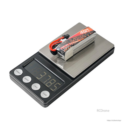 LAVA 450mAh LiHV battery on digital scale showing 37.85 g weight, angled side view