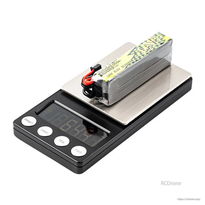 LAVA II 4S LiHV battery placed on a digital scale, showing pack size and balance lead