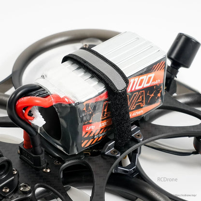 BetaFPV LAVA Series 6S 1100mAh 100C LiPo Battery strapped on FPV drone frame as installed
