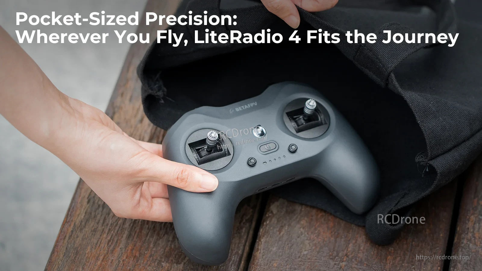 LiteRadio 4 compact transmitter being placed in a bag, emphasizing portable, travel-friendly size