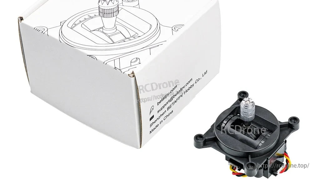 BETAFPV LiteRadio transmitter nano gimbal next to retail box; replacement stick assembly with wires attached