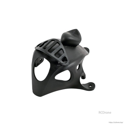 Black micro FPV canopy with raised top cover, front-left view showing vent slots and camera opening