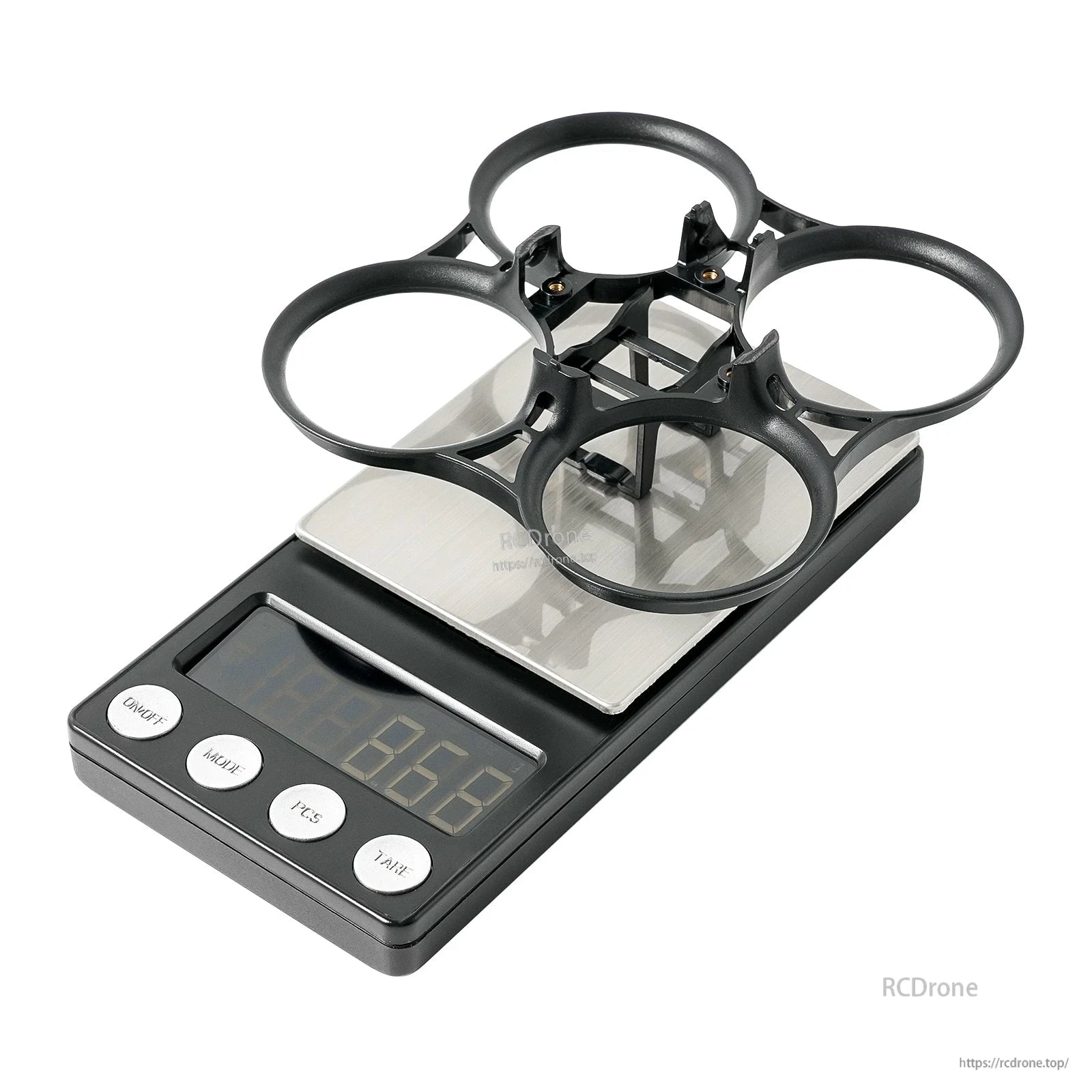 PA12 duct ring frame on digital scale, angled view showing four ducts and center mounting area