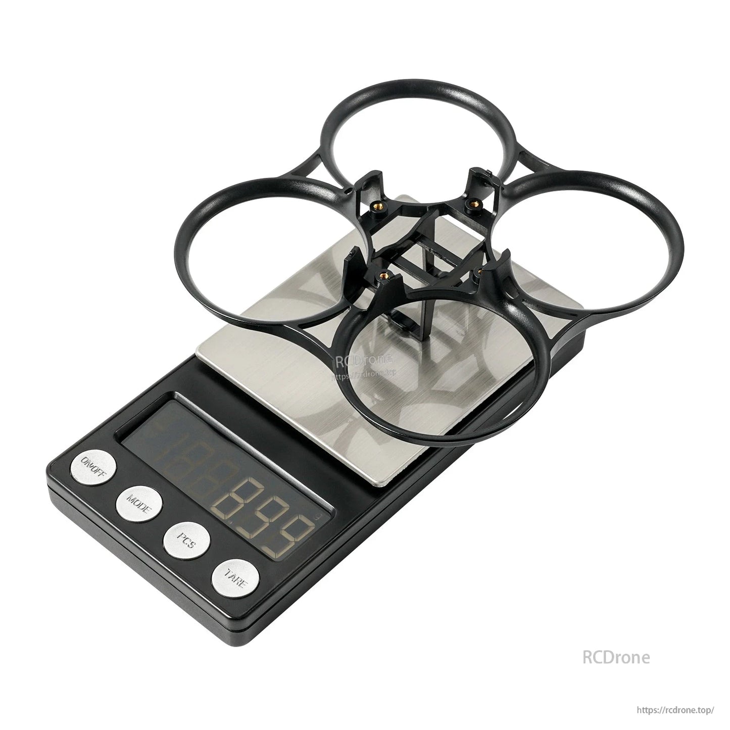 Bare ducted whoop frame on digital scale, showing lightweight four-duct PA12/PP frame