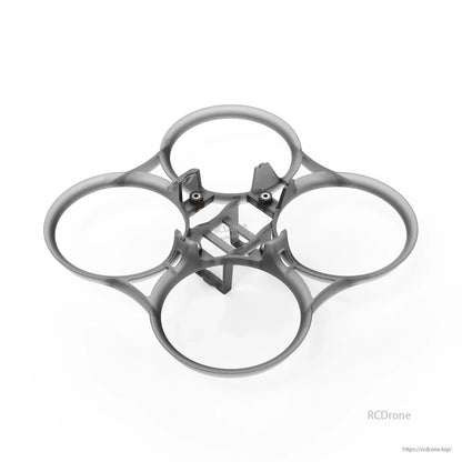 Gray ducted whoop frame top view with four prop guards and central standoff mounts