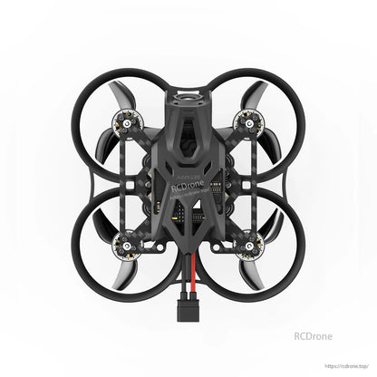 Top view of a BetaFPV whoop-style ducted quadcopter with four protected prop ducts and battery lead