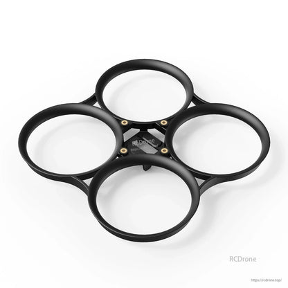Black 4-duct whoop frame bumper ring with brass inserts, top view