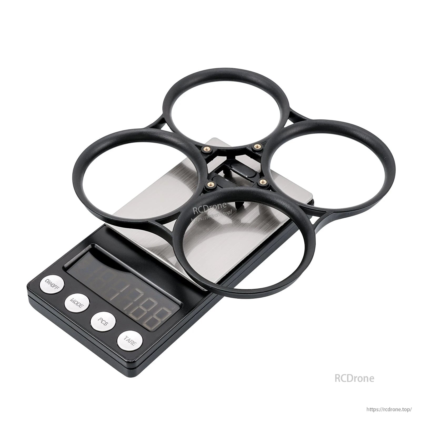 Black bumper ring on scale showing 17.8 g weight, angled view