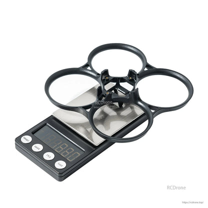 Pavo20 Pro II duct frame on digital scale, 4 circular prop guards with center mount structure