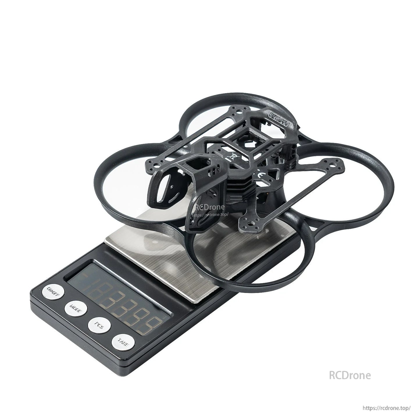 BetaFPV Pavo20 Pro II brushless whoop frame on digital scale, PA12/PP ducts and mounting cage
