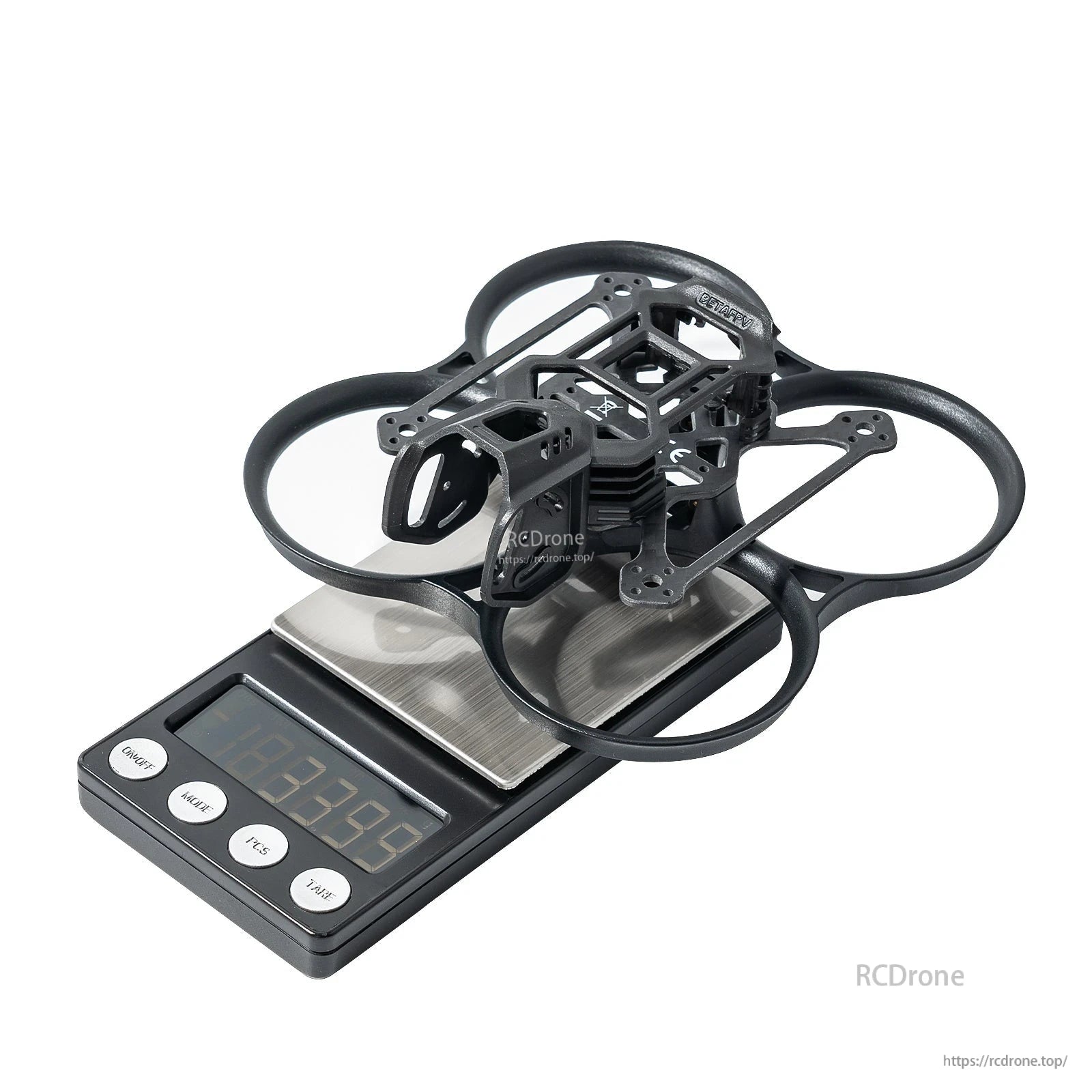 BetaFPV Pavo20 Pro II brushless whoop frame on digital scale, PA12/PP ducts and mounting cage