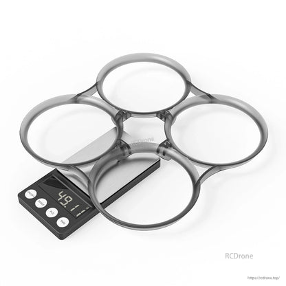 Pavo35 duct ring set on digital scale, four-piece 92mm whoop guard assembly