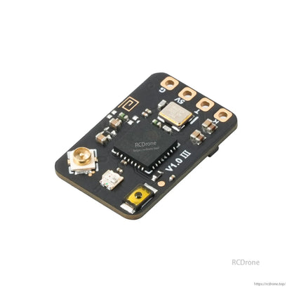 Close-up of receiver PCB side with antenna connector, chips, and solder pads