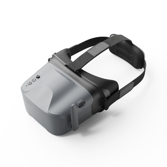 BetaFPV VR04 analog FPV goggles with integrated head strap, top control buttons, and side USB-C charging port