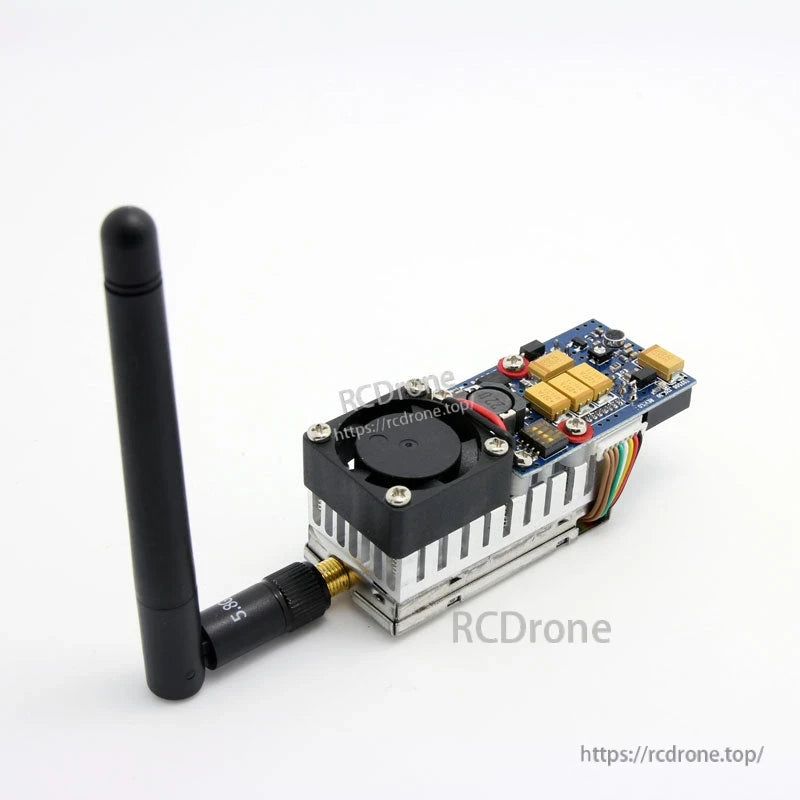 Side angle showing cooling fan on heatsink and RP-SMA antenna mounted on the transmitter