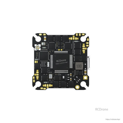 Top view of F4 AIO ELRS flight controller board with “100” inductor marking and USB port