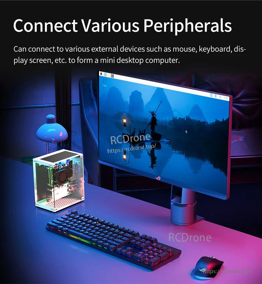Desktop setup with the cube case connected to monitor, keyboard, and mouse as a mini PC workspace