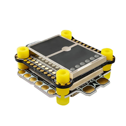 DarwinFPV Cement F4 FC + 60A waterproof ESC stack, 30.5x30.5mm, angled view with yellow gummies