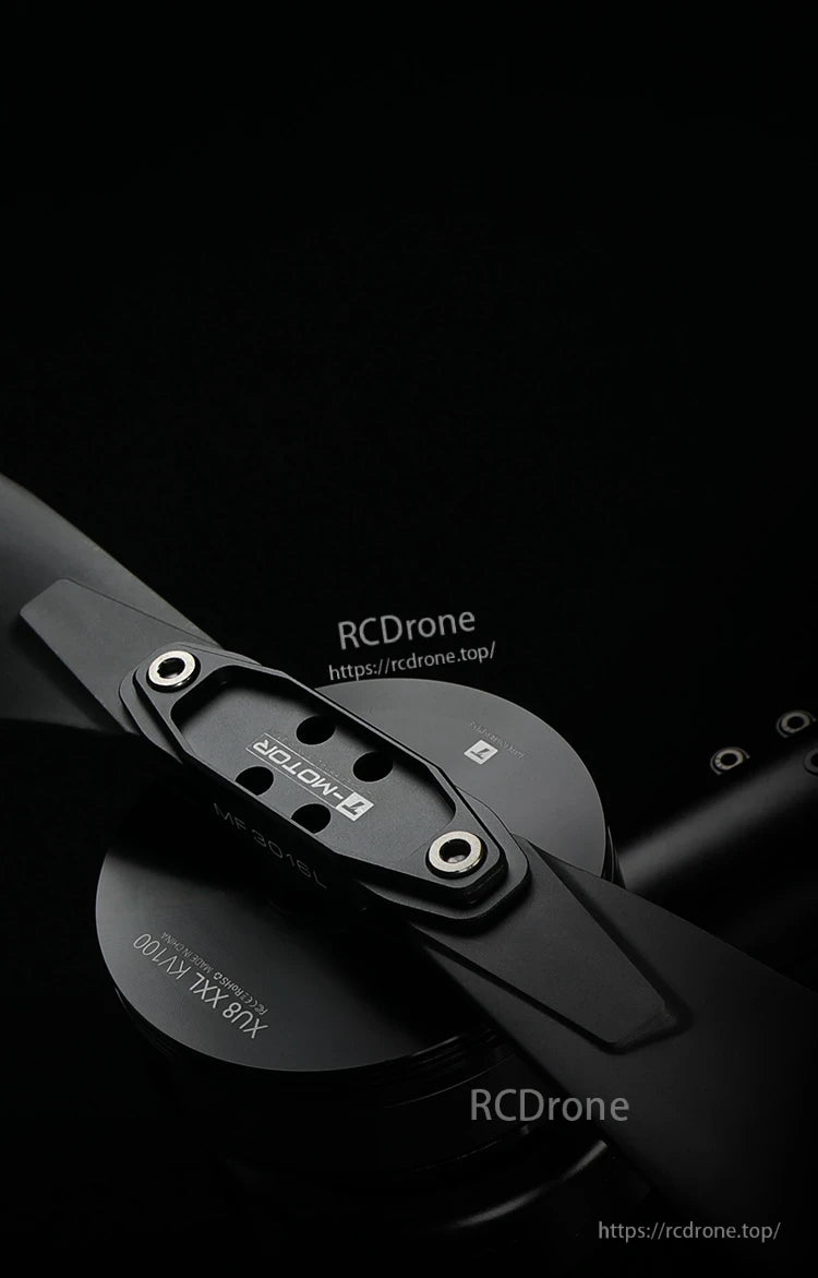 Close-up of a T-Motor folding drone propeller mounted on a motor hub with metal fasteners