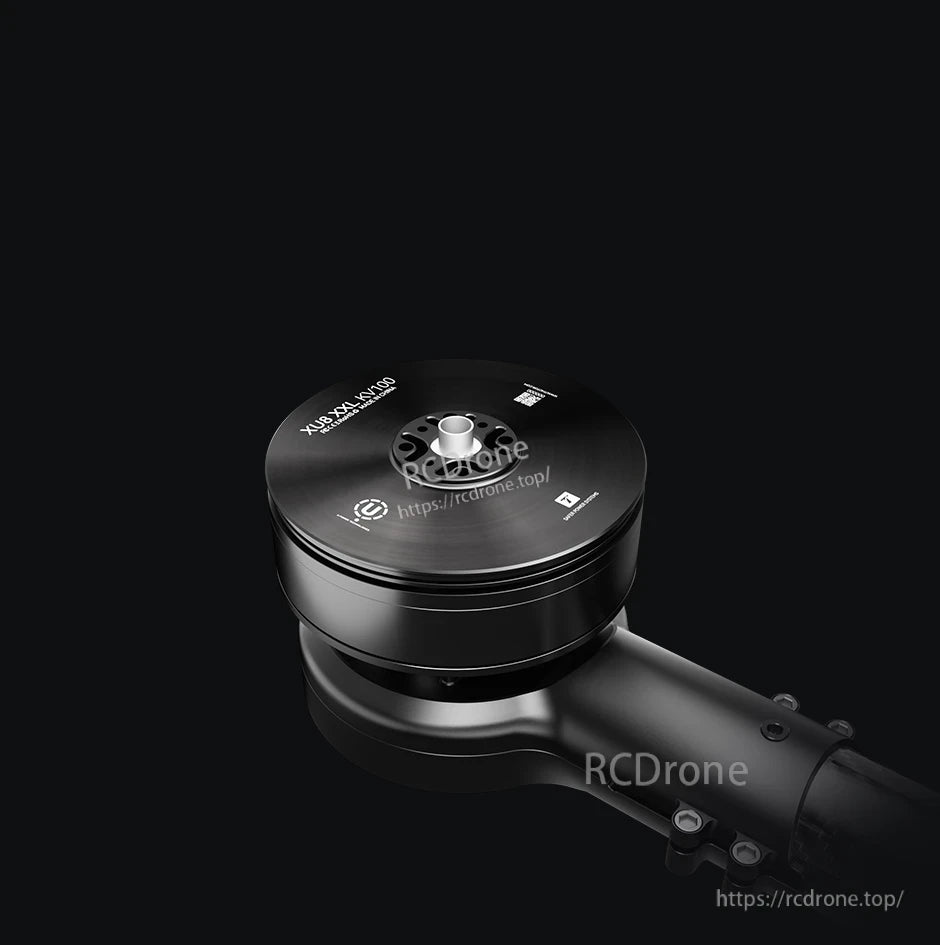 Close-up of a black T-Motor drone propulsion motor with top cap markings and central mounting hub on an arm.