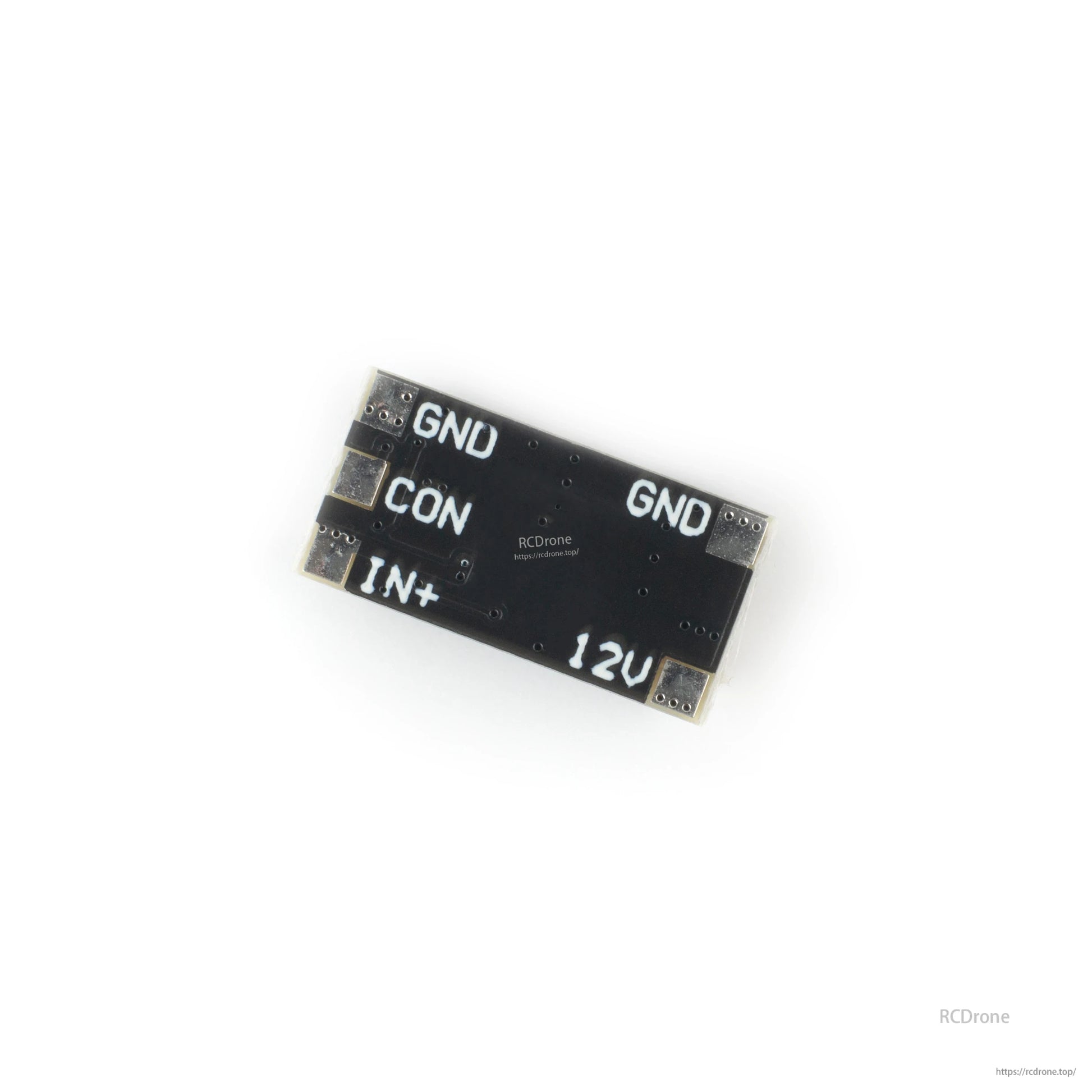 Bottom side of BEC board with solder pads and printed labels GND, CON, IN+, and 12V