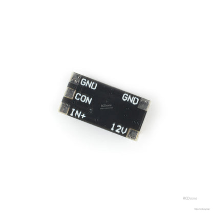 Bottom side of BEC board with solder pads and printed labels GND, CON, IN+, and 12V