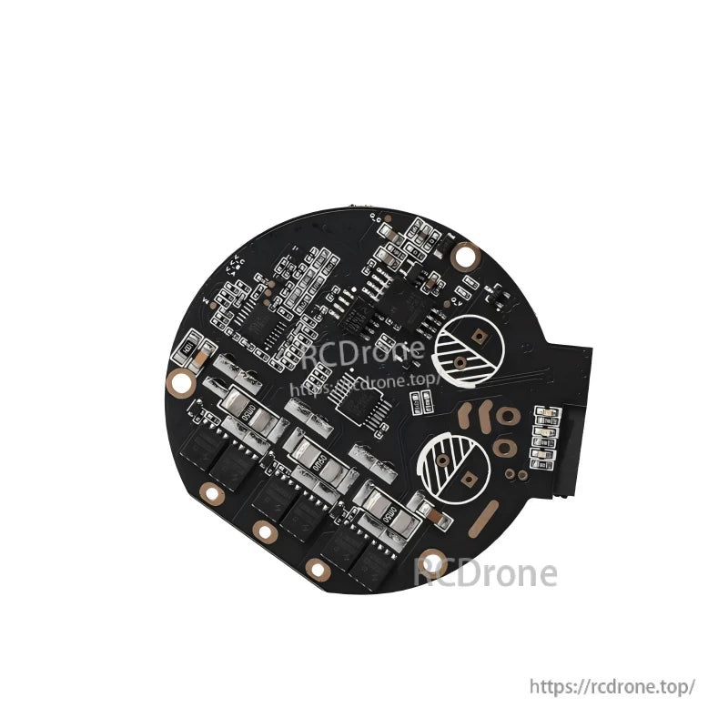 Angled underside view of controller board showing power MOSFET area, solder pads, and two circular pad zones