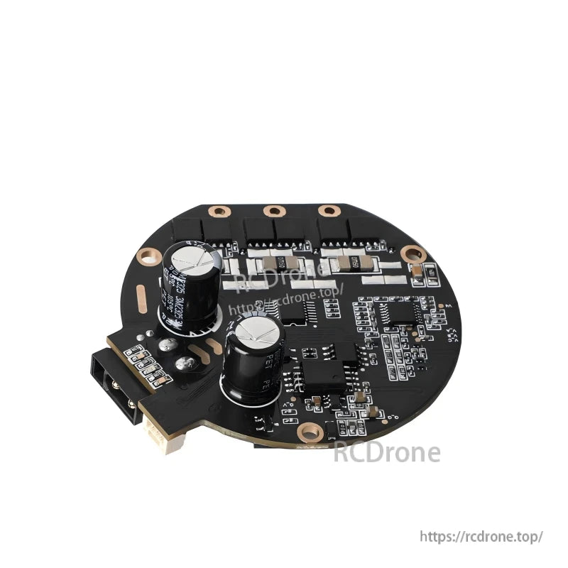 Angled back view highlighting two electrolytic capacitors and power stage components on the controller board