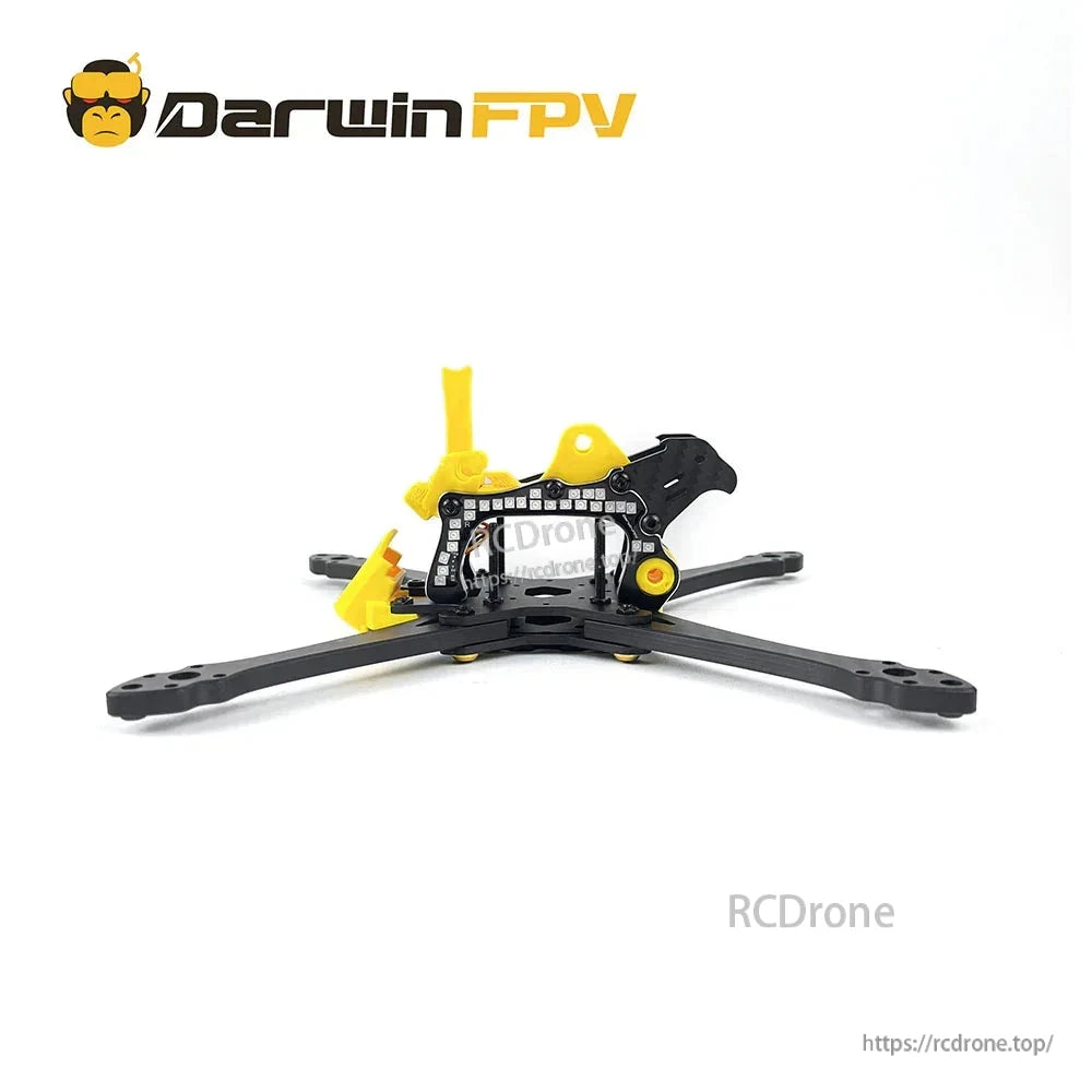 Carbon fiber FPV drone frame with extended arms and yellow brackets, no floats attached